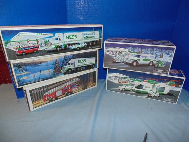 5 Hess Trucks: Group of 5 Hess trucks in original boxes 1992, 1987, Fire Truck Bank, 2004, 2001. VEry good condition.
