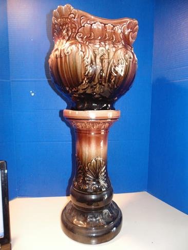 Jardinaire and Pedestal: Lion heads and shell design. 27" tall.