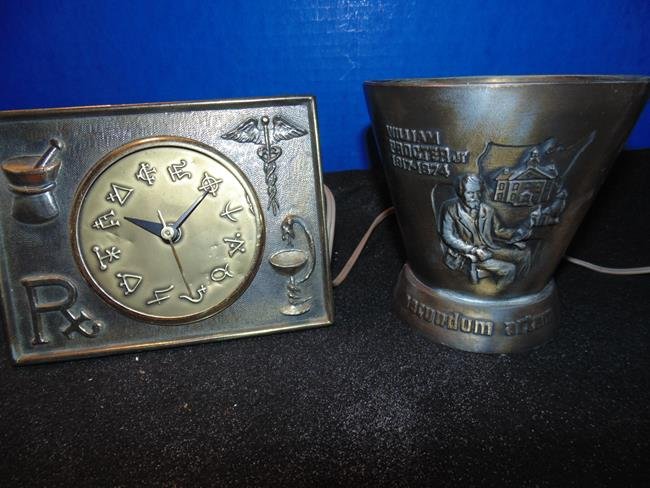 Pharmacy Clock & Urn: Desk clock and urn with pharmaceutical design.