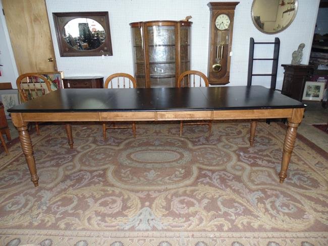 Contemporary Walnut Dining Room Table: Contemporary walnut dining room table. 94" with 2 leaves. Twist legs.