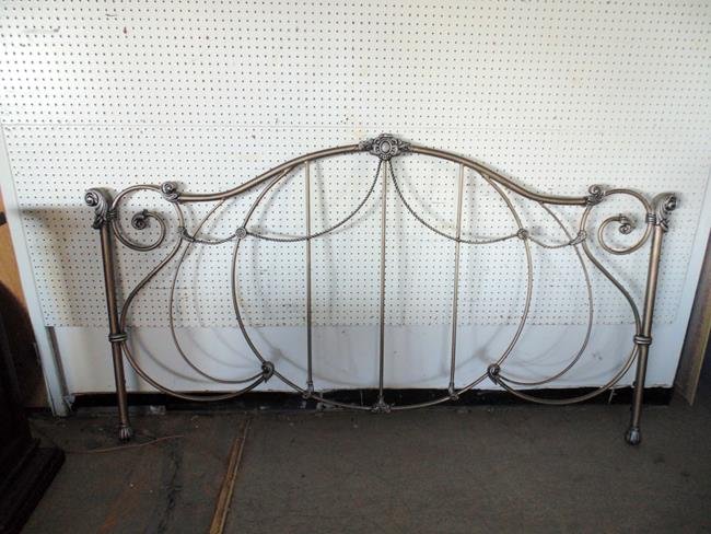 Ornate Headboard: Ornate metal headboard. King size.