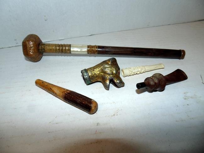 Cigarette Holders and Umbrella Handles (1 of 1)