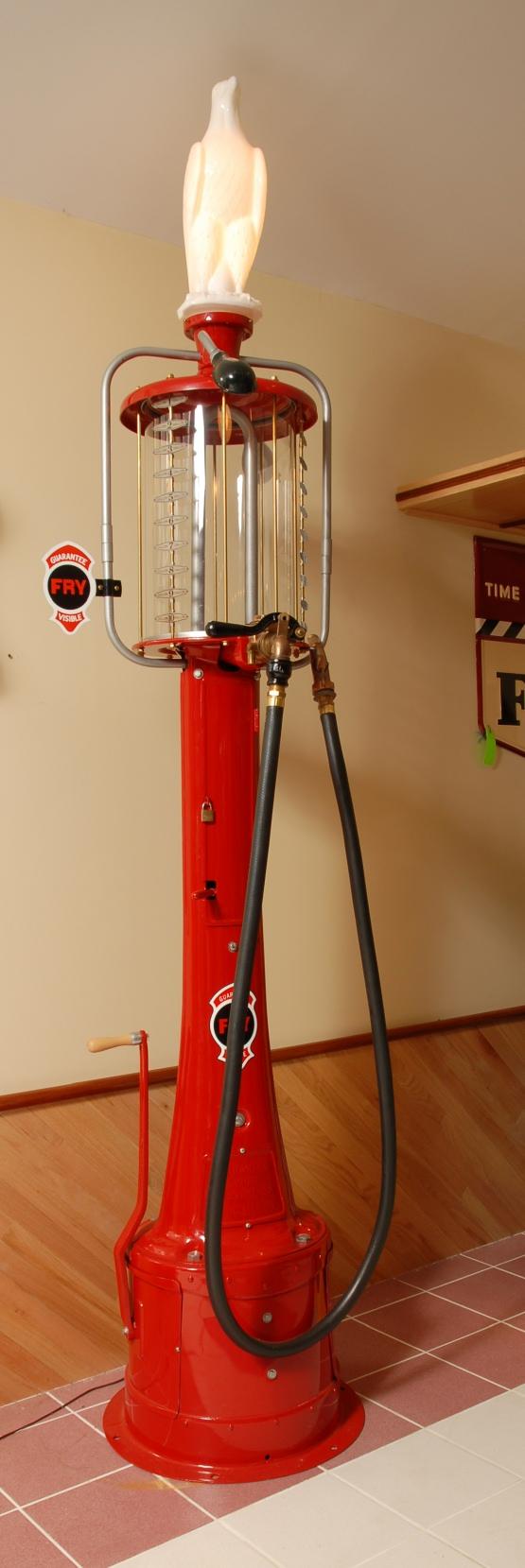 Guarantee Model 77 restored 1920's hand crank 10 ga: Guarantee Model 77 restored 1920's hand crank 10 gallon visible gas pump with eagle globe, 124"h