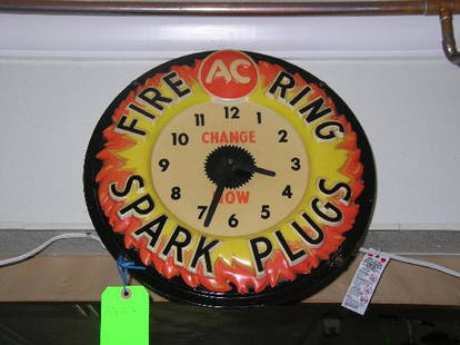 AC "Fire Ring" spark plugs yellow and orange wall: AC "Fire Ring" spark plugs yellow and orange wall clock