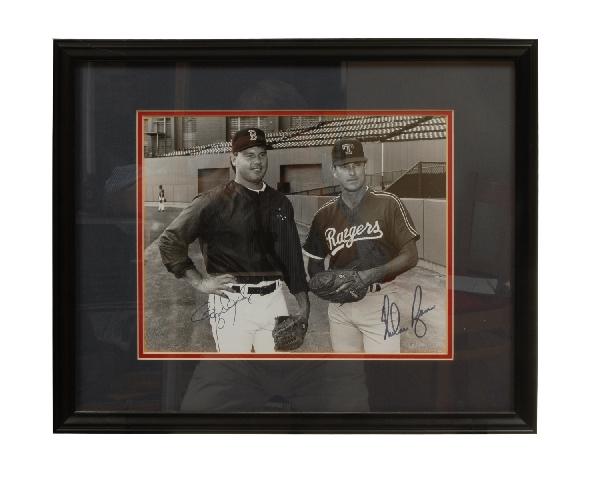 Roger Clemens and Nolan Ryan photo, Fenway Park, 1: Roger Clemens and Nolan Ryan photo, Fenway Park, 1992, autographed and framed together with Louisville TPX baseball glove, signed Roger Clemens, with Certificate of Authenticity #194101 from Field of 