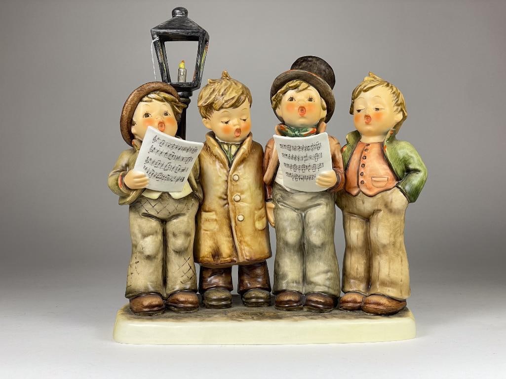 Hummel Figurine: Harmony In Four Parts (10x9") 572 TMK6 Low Estimate: 1000, High Estimate: 1500 This lot is from the Jack and Bette Lessard extensive Hummel Collection. Descriptions, titles, mold numbers, TMK numbers,