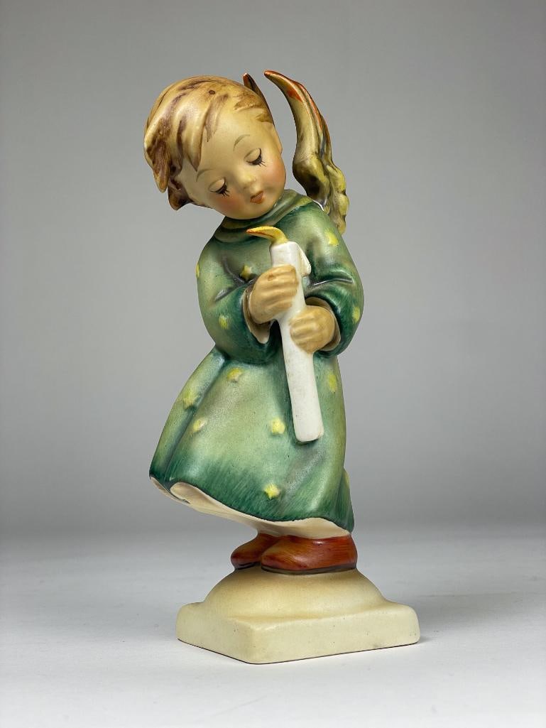 Hummel Figurine: Heavenly Angel (6") 21/0 1/2 TMK2 Low Estimate: 100, High Estimate: 200 This lot is from the Jack and Bette Lessard extensive Hummel Collection. Descriptions, titles, mold numbers, TMK numbers, and si