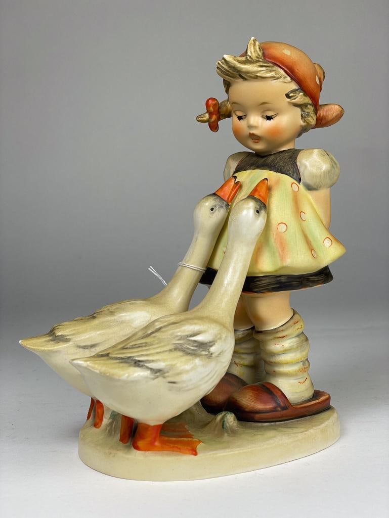Hummel Figurine: Goose Girl (7.5") 47 II TMK3 Low Estimate: 100, High Estimate: 200 This lot is from the Jack and Bette Lessard extensive Hummel Collection. Descriptions, titles, mold numbers, TMK numbers, and sizes h