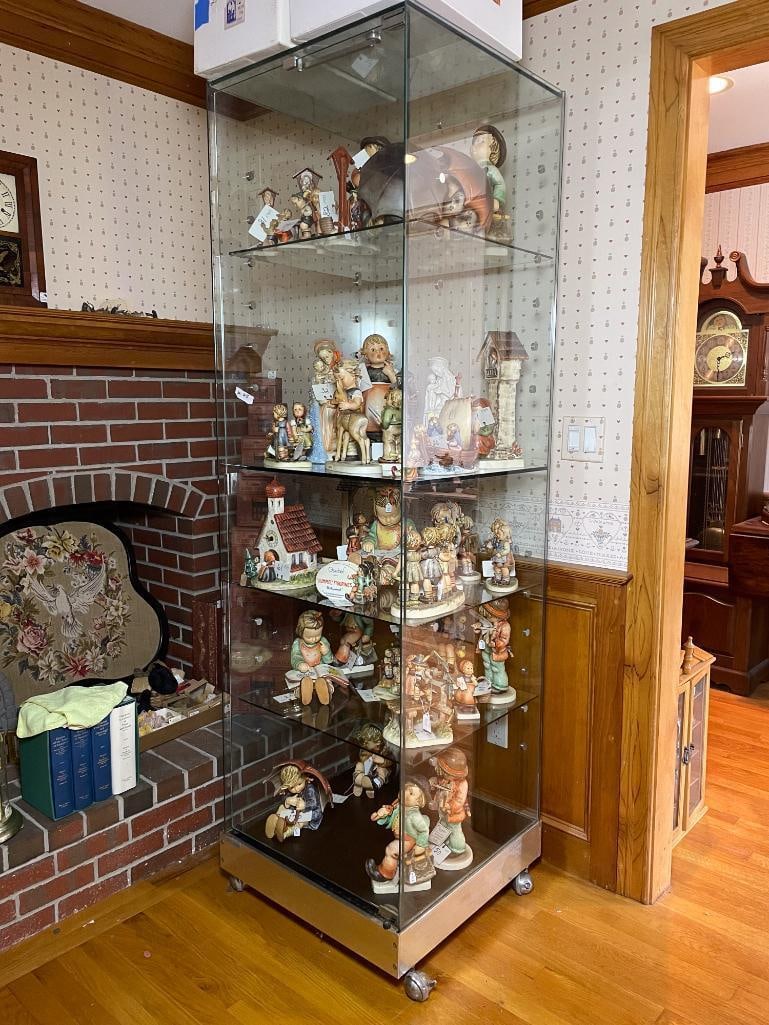 Showcase: Showcase - The Contents are not included in this lot. Low Estimate: 50, High Estimate: 1000 This lot is from the Jack and Bette Lessard extensive Hummel Collection. Descriptions, titles, mold numbers,