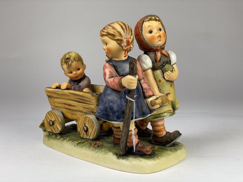 Hummel Figurine: Pleasant Journey (6") 406 TMK6 Low Estimate: 1000, High Estimate: 2000 This lot is from the Jack and Bette Lessard extensive Hummel Collection. Descriptions, titles, mold numbers, TMK numbers, and siz