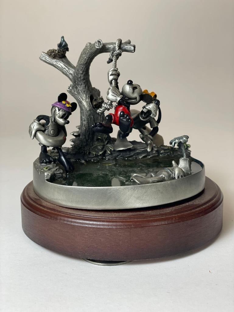 4 Piece Disney Hudson Creek Pewter Figurine Lot: Gone Fishing MA8342 Just Goofy - unpainted - MA8303p The Duck (P) MA7712 Simply Minnie (P) MA8026 Low Estimate: 50, High Estimate: 1000 This lot is from the Jack and Bette Lessard extensive pewter fig