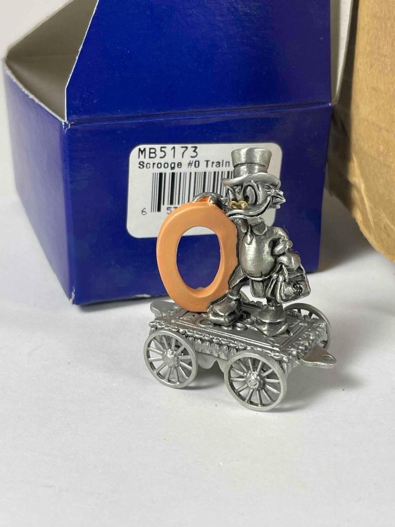 Hudson Creek Pewter Disney Miniature Figurine Box Lot: Hudson Creek Pewter Disney miniature figurine box lot Low Estimate: 50, High Estimate: 1000 This lot is from the Jack and Bette Lessard extensive pewter figurine collection. Descriptions, titles, and