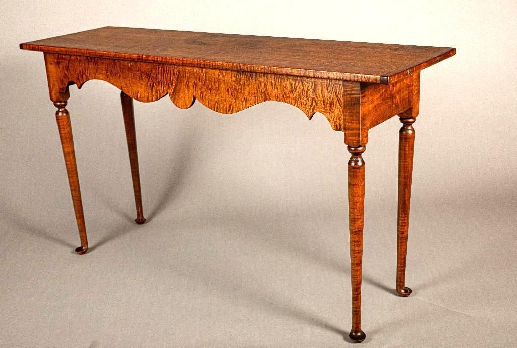 D. R. Dimes tiger maple console table: D. R. Dimes tiger maple console table with bread board ends, and a nicely shaped bold tiger maple skirt, 50" wide x 28-1/8" high x 14-1/2" deep Provenance: The Personal Collection of Douglas R. Dimes