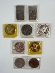 Seven Silver Commerative Coins and Two Ingots