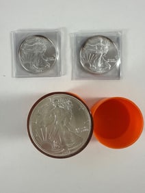 Twenty 1987 Walking Liberty Silver Dollars and Two 2004 Silver Dollars