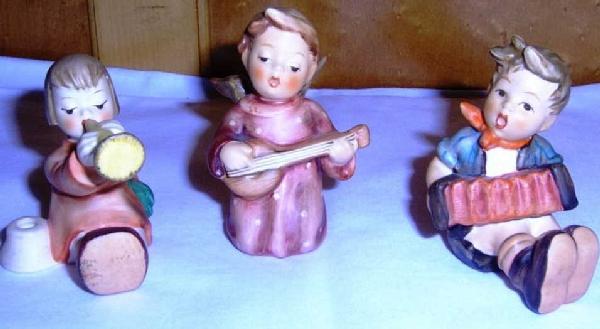 Hummel Figurines All Of These Pieces Are Sold As A S: Hummel Figurines All Of These Pieces Are Sold As A Set. This Set Contains 3 Musicians Made In 1957. 1/40 274d 3 Piece Nativity Scene. 274 A&b 214a Made In 1951. Little Girl Holding Christmas Tree/cand