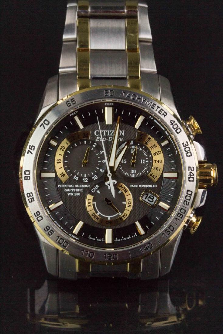 Citizen Eco Drive Perpetual Chronograph Watch: Citizen Eco Drive perpetual chronograph watch; watch face shows radio controlled, water resistant 200, and sapphire crystal; retail $675, L: 12 cm, D: 3.1 cm, 176 grams