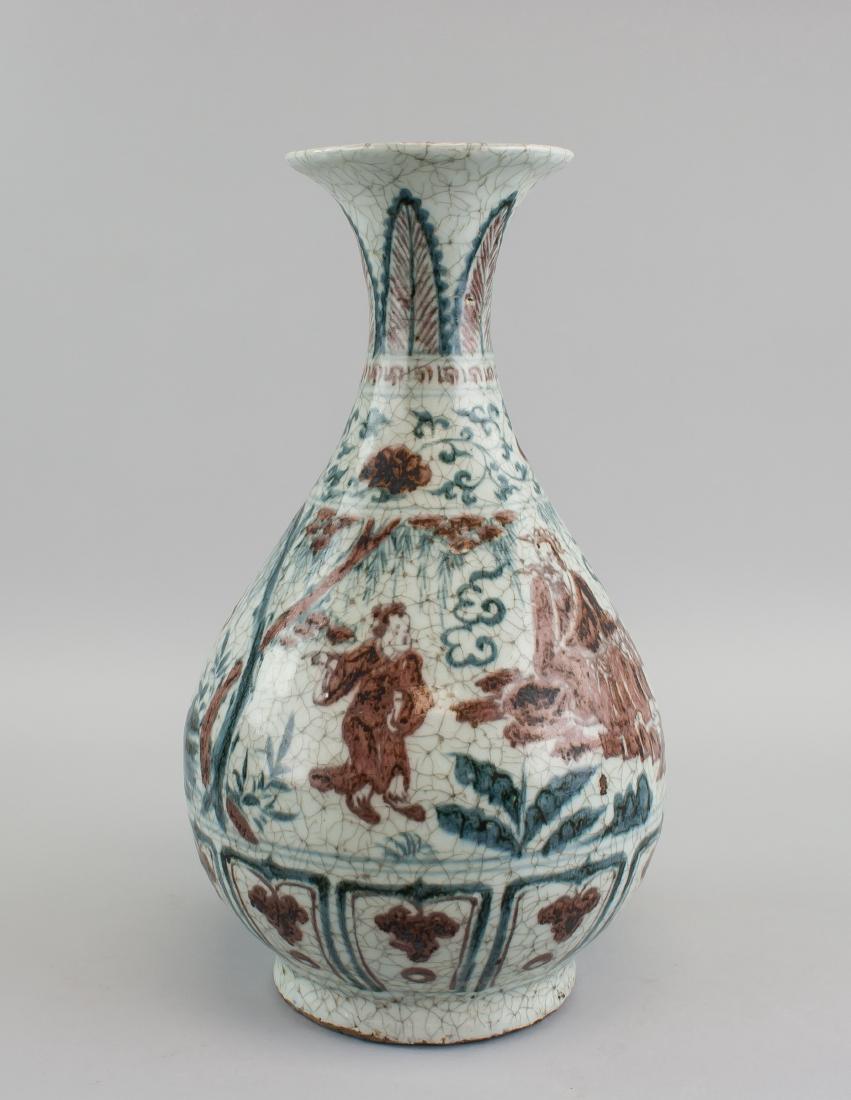 Chinese Ming Style B & W Copper Red Porcelain Vase: Chinese Ming style blue and white and copper red porcelain vase; of pear shape body, narrowed neck with splayed mouth rim; supported on short foot rim; painted with figures, floral and leafy pattern;