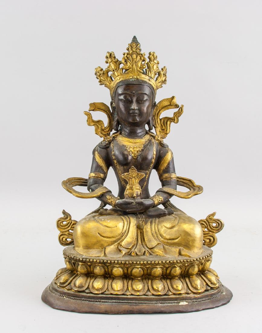 Tibetan Gilt Bronze Amitabha Statue with Mark: Tibetan gilt bronze buddha statue; depicting seated Amitabha on lotus pedal base; wearing religious garments; mark on base; early 20th Century; 33 x 23 cm, 4 kg. PROVENANCE: Private Scarborough collec