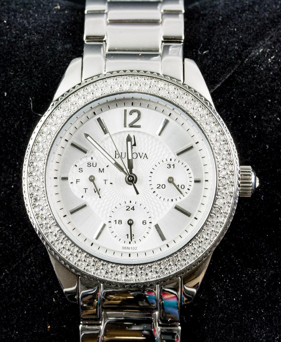 Bulova Stainless Steel Watch: Bulova stainless steel watch; water resistant, stainless steel chain band; C8691071C. Japan Movement, Hong Kong Band.