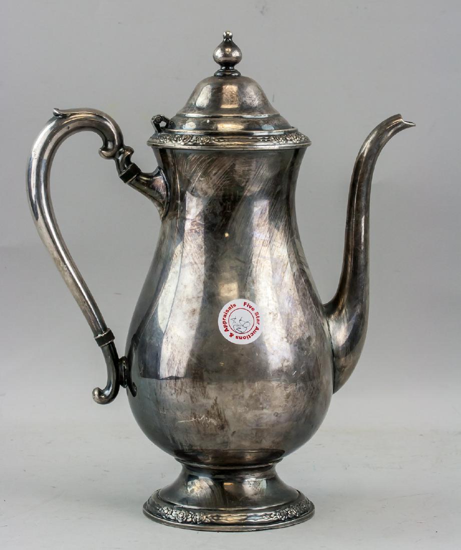 American International Silver Company Teapot: American International Silver Company teapot. of teardrop shape body. Flanked with long curved handle and spout. Base marked and lettering CAMILLE, INTERNATIONAL SILVER COMPANY, 6001. With previous au
