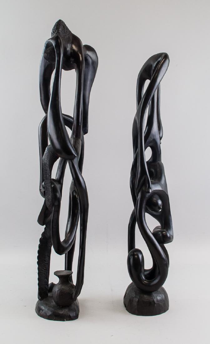 Pair of African Ebony Fertility Sculptures: Pair of ebony wood carved fertility sculptures. 64 x 22 cm, 4540 grams (total)