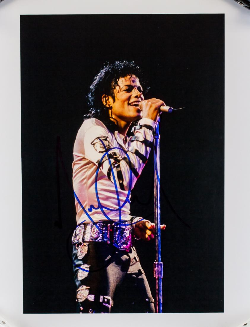 Michael Jackson Autographed Photograph JSA Letter: Autographed photograph, signed Michael Jackson (1958-2009, American). Accompanied with a James Spence Authentication JSA Letter of Authenticity. 25 x 17 cm (9.8 x 6.7 inches)
