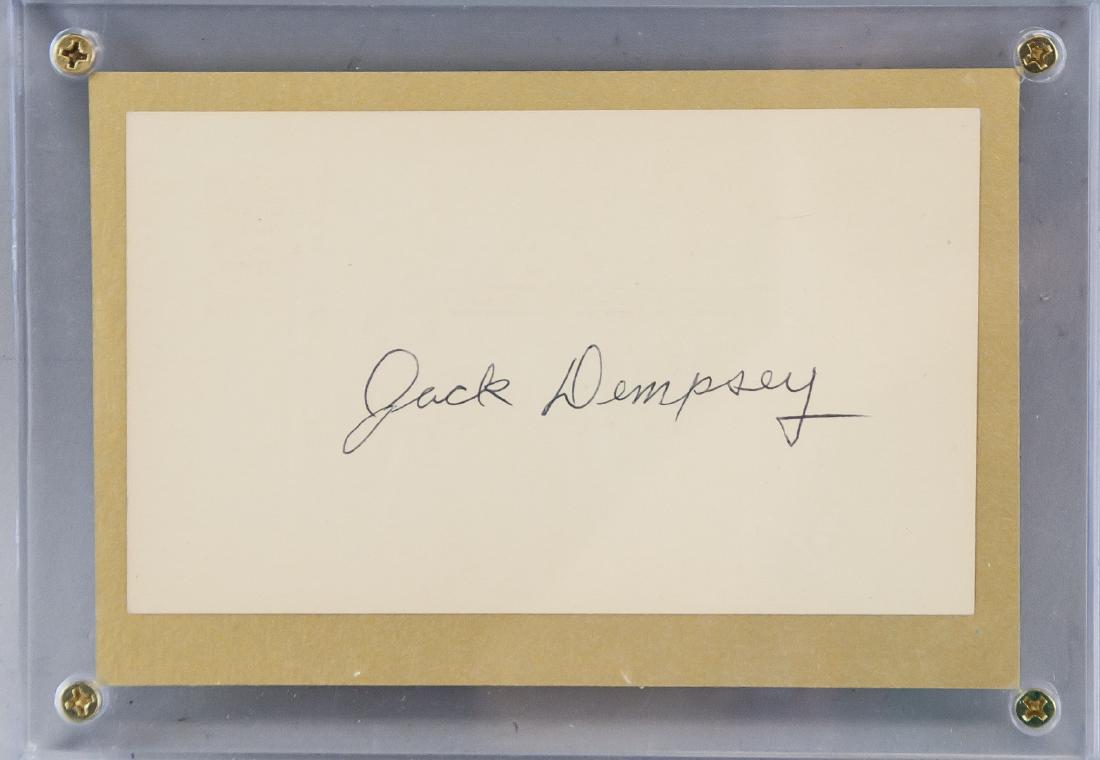 Jack Dempsey Autographed Cut Card with COA: Autographed cut card, signed Jack Dempsey. Accompanied with a certificate of authenticity. 12.5 x 17.5 cm. Photograph not included. William Harrison "Jack" Dempsey (1895-1983), nicknamed "Kid Blackie"