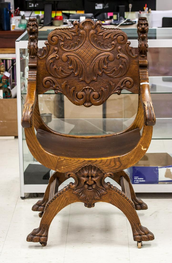 Russian Antique Wood Lion Chair: Russian antique wood chair. Carved lion and face. With wheels on legs. 105 x 62 x 62 cm