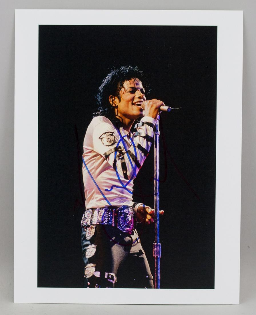 Michael Jackson Autographed Photograph JSA Letter: Autographed photograph. Signed Michael Jackson. 28 x 21.5 cm (11 x 8.5 in). Accompanied with JSA letter of authenticity. Michael Joseph Jackson (1958-2009) was an American singer, songwriter, and danc