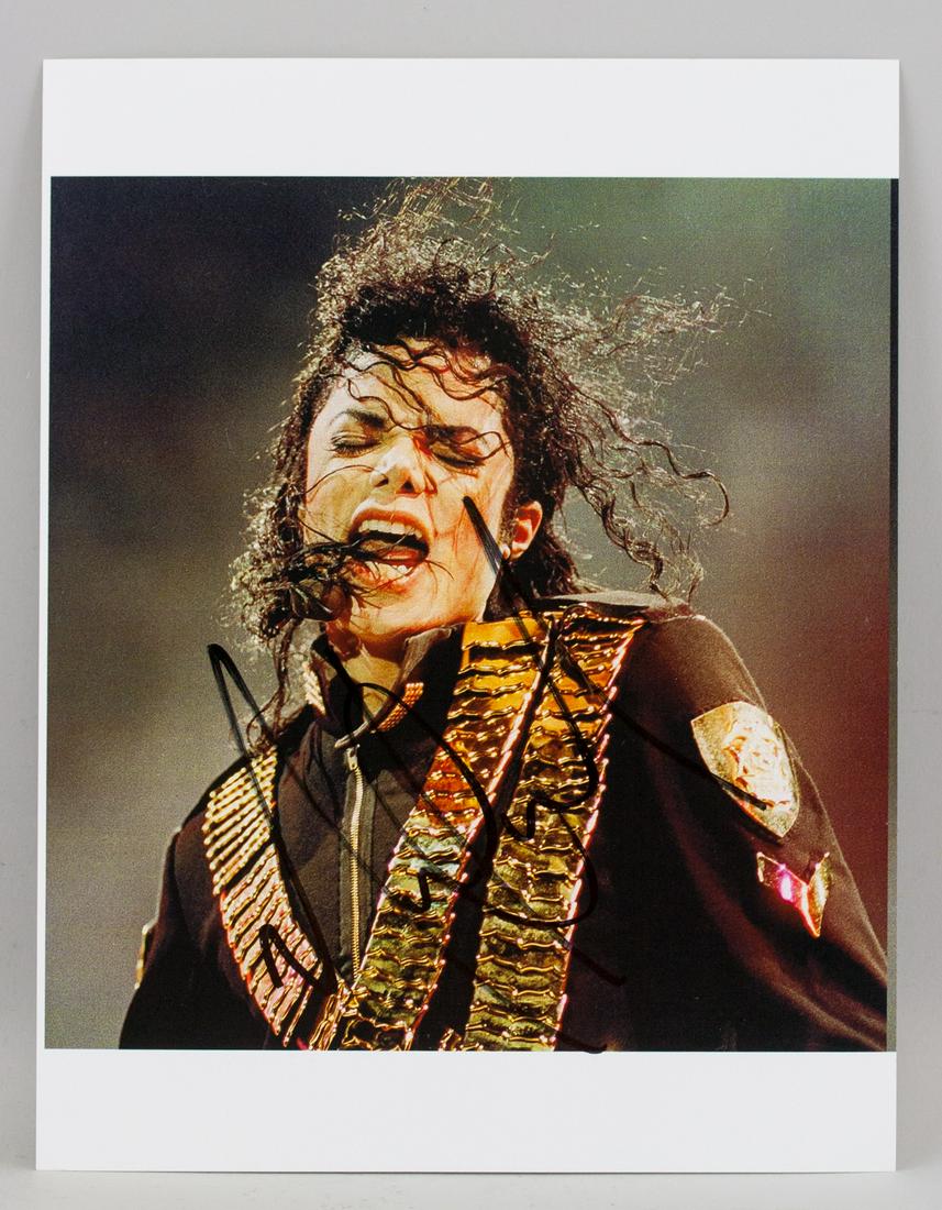 Michael Jackson Autographed Photograph JSA Letter: Autographed photograph. Signed Michael Jackson. 28 x 21.5 cm (11 x 8.5 in). Accompanied with JSA letter of authenticity. Michael Joseph Jackson (1958-2009) was an American singer, songwriter, and danc