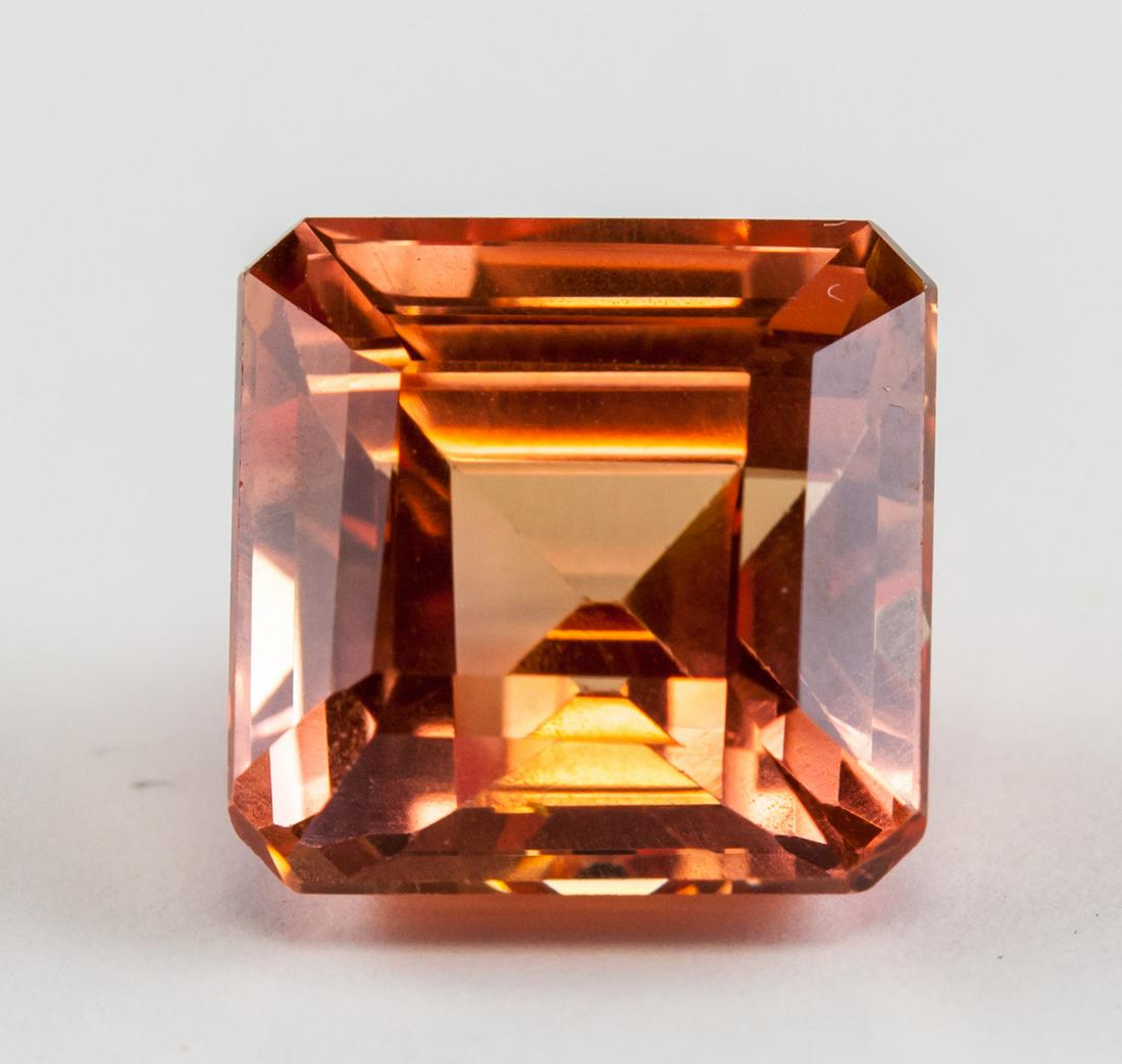 9.30ct Emerald Cut Padparadscha Sapphire GGL (1 of 4)