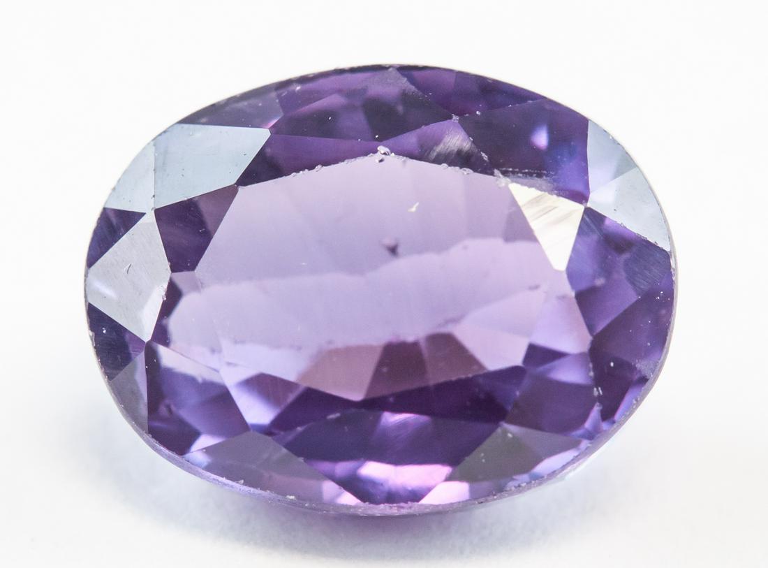 5.45ct Oval Cut Purple Natural Alexandrite GGL: One (1) 5.45 ct oval cut purple to blue natural alexandrite. Origin: Brazil. 10.82 x 8.48 x 5.84 mm. Accompanied with GGL certificate.