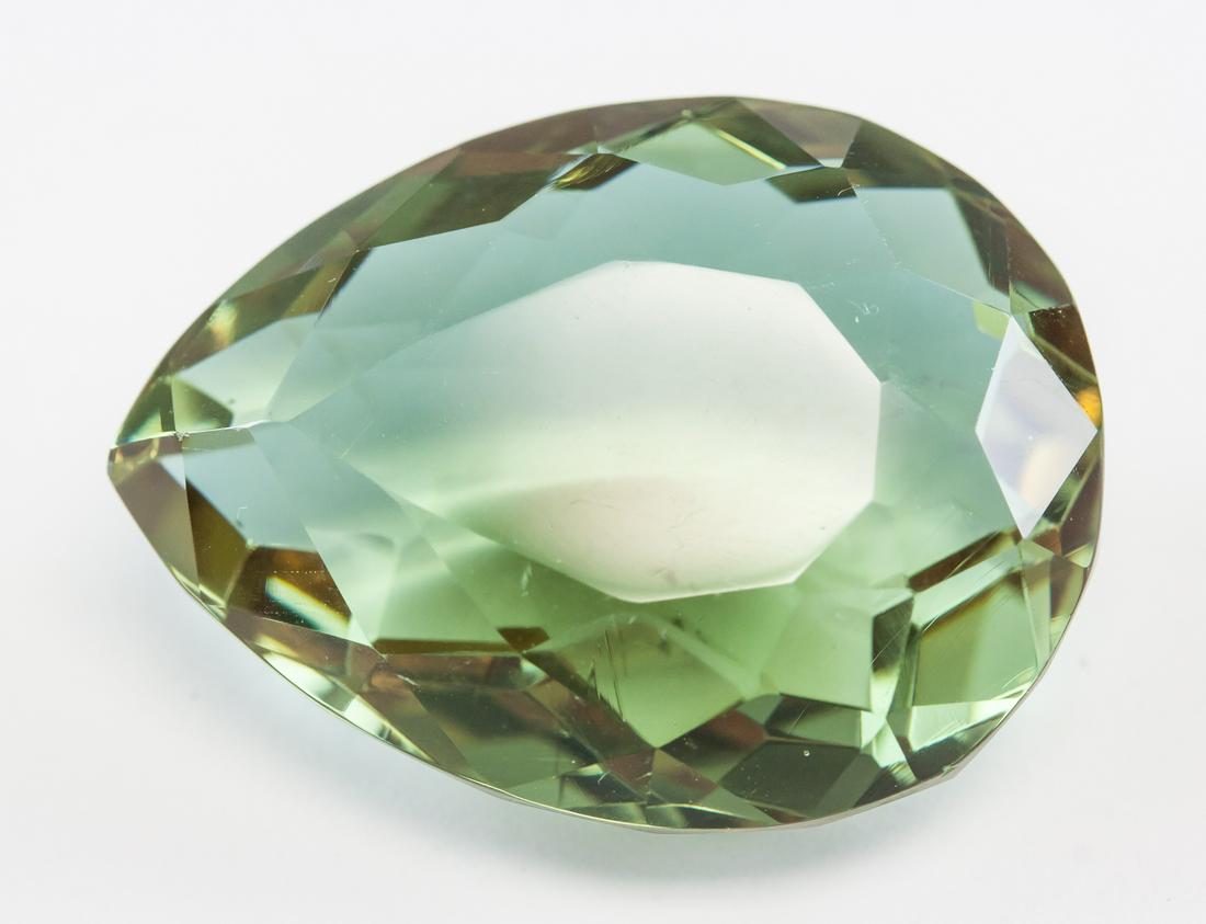 66.25ct Pear Cut Brown to Green Alexandrite GGL: One (1) 66.25 ct pear cut brown to green Alexandrite. Origin: Brazil. Accompanied with a GGL certificate. 30.64 x 23.08 x 14.37 mm