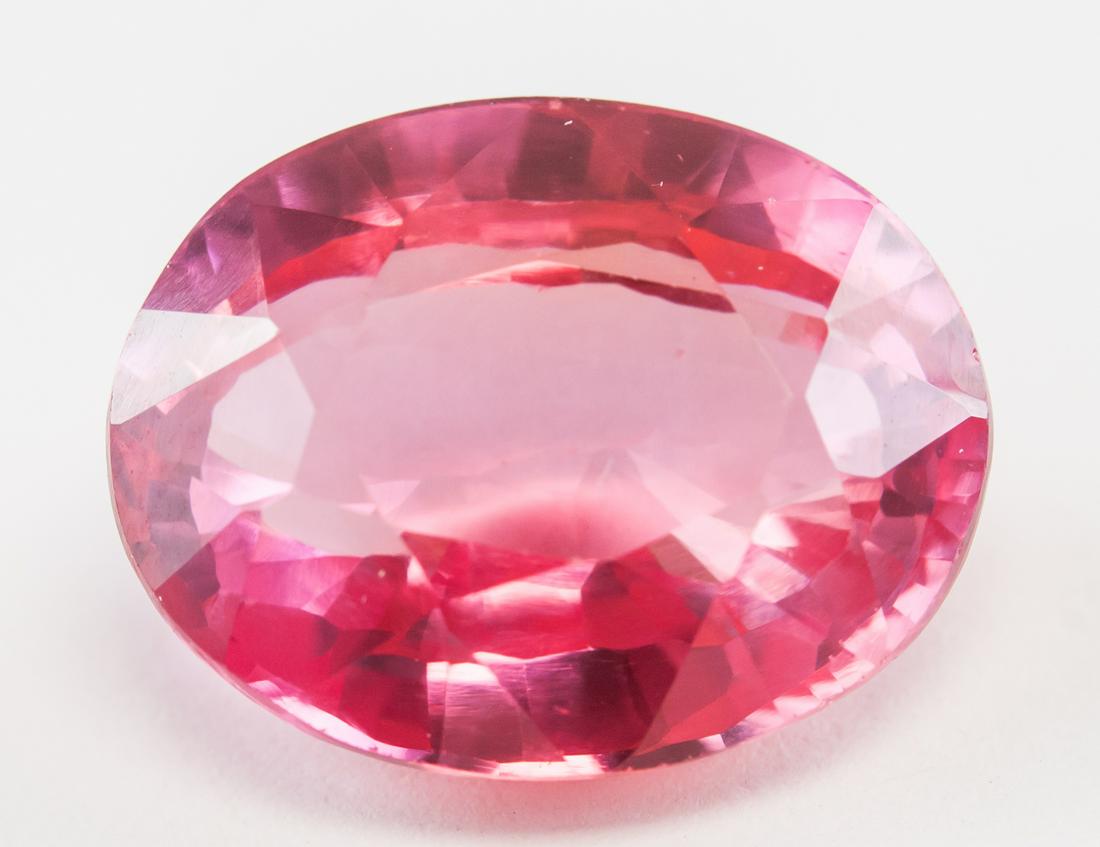 11.50ct Oval Cut Pink Natural Spinel GGL: One (1) 11.50 ct oval cut pink natural spinel. Origin: Sri Lanka. Accompanied with GGL certificate.