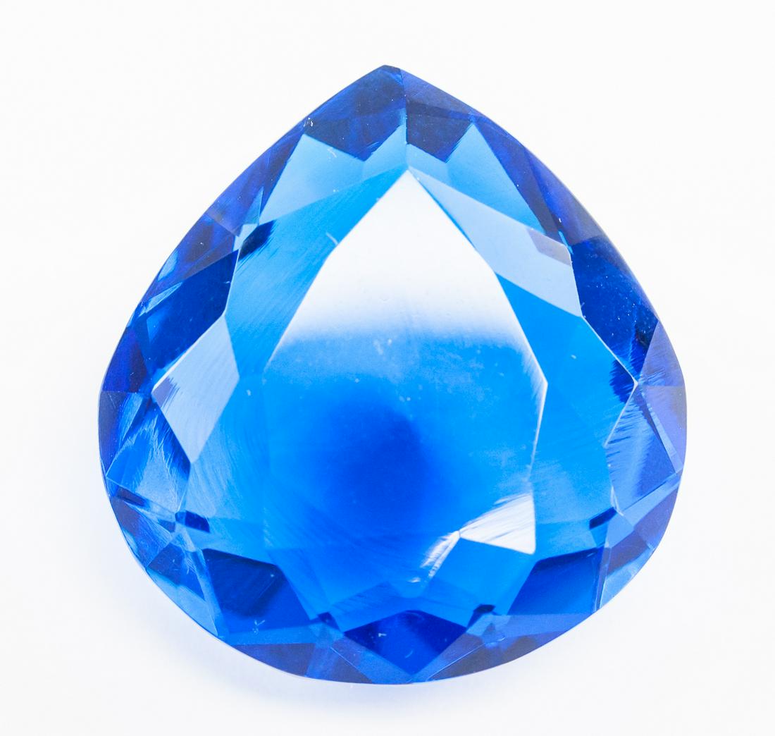 82.65ct Pear Cut Blue Tanzanite GGL: One (1) 82.65 ct pear cut blue tanzanite. Origin: Tanzania. Accmpanied with GGL certificate. 30.30 x 28.76 x 16.15 mm.
