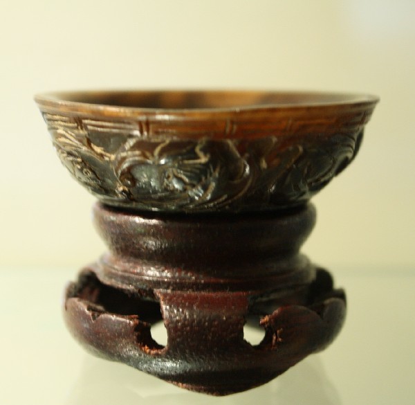 Small rhino horn cup, fine carved, with motif on t: Small rhino horn cup, fine carved, with motif on the exterior of bats, Ru Yi, Qing Dynasty, H: 7/8", D: 2 1/4"