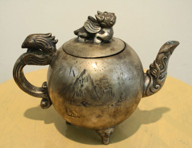 Silver pot with dragon handle, Bi Xie decorated l: Silver pot with dragon handle, Bi Xie decorated lid with four character of Long Feng Cheng Xiang, Qiang Long marks, 19th century, H: 5 1/4", W: 7"