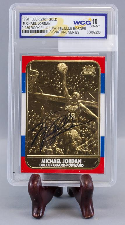 1998 Fleer 23kt Gold Michael Jordan: 1998 Fleer 23kt gold sports card. Featuring Michael Jordan. Printed signature.