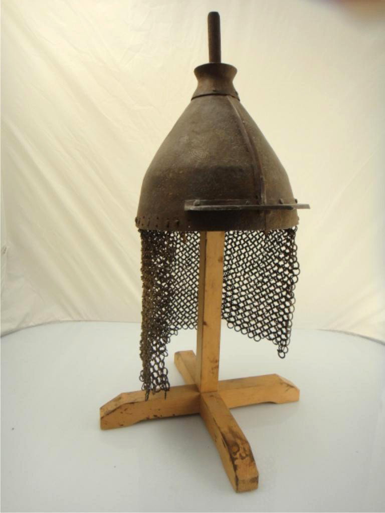 Korean Chosun Dynasty Bronze Chain Mail Helmet: RARE KOREAN CHOSUN DYNASTY BRONZE CHAIN MAIL HELMET Rare 15th Century Korean Chosun Dynasty chain mail helmet; with inlaid symbols and designs 20" tall, 10" long, 8" wide, wood stand | METALLICS