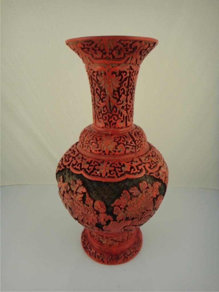 Chinese Cinnabar Vase with Maker's Mark: CHINESE CINNABAR VASE WITH MAKER'S MARK Chinese cinnabar vase; maker's mark on base Period / Date: 20th Century Dimensions: 14 6/8" tall, 8 1/2" deep