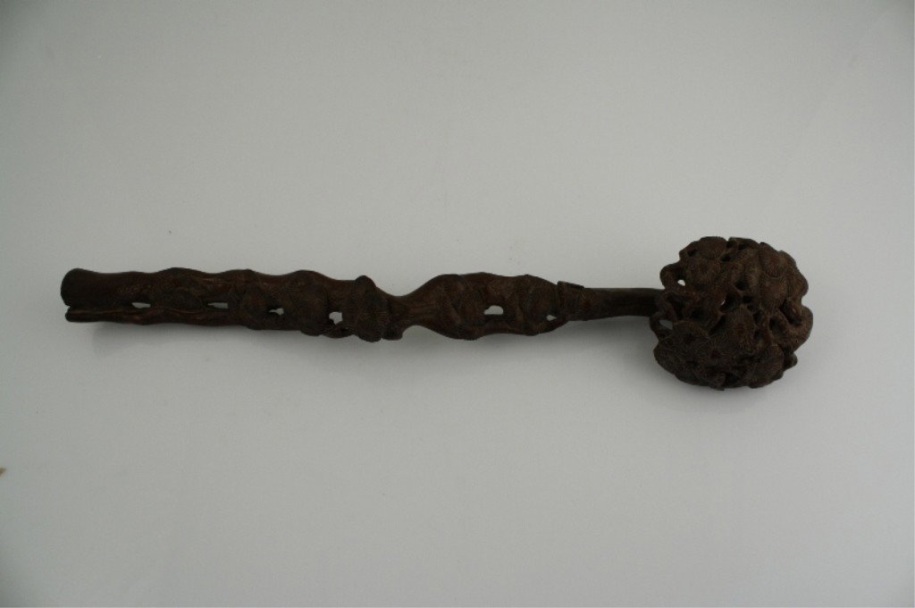 Chinese Wood Ruyi Scepter: CHINESE WOOD RUYI SCEPTER Antique Chinese rose wood scepter; naturalistically ruyi fungus form with undulated handle; shaft carved with lingzhi in relief Form / Medium Used: Wood Dimensions: 15 1/4" l