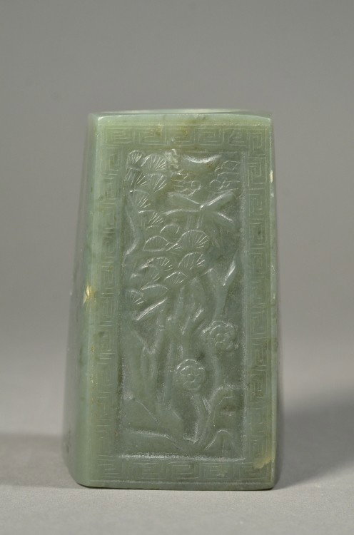 Qing Dynasty Hetian Jade Paper Weight: Well hollowed Chinese Qing Dynasty hetian spinach green jade paper weight: with relief carvings of landscape; 3 3/4: tall, 2 1/4" wide, 360 grams