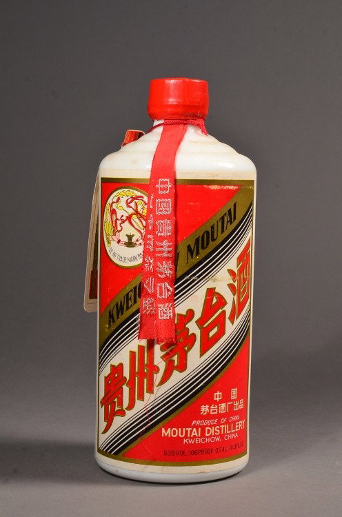 Vintage Moutai Chinese Grain Wine C. 1980: Vintage Kweichow Moutai (Maotai) grain wine 53% Alc/Vol; unopened with seal and tag, Circa 1980; H: 20 cm