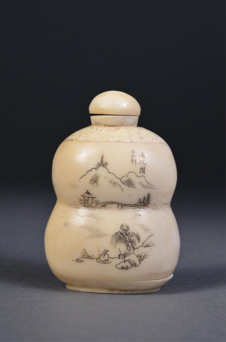 Chinese Ivory Snuff Bottle Landscape Scene: Chinese ivory snuff bottle; double gourd form; the front with Incised design and painted landscape scene; on verso, incised calligraphy; matching stopper; H: 5.75 cm, W: 3.75 cm