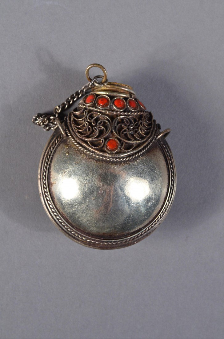 Chinese Silver Snuff Bottle in Locket Form: Chinese silver snuff bottle in locket form; of flattened bulbous form; H: 5.5 cm, W: 4.5 cm