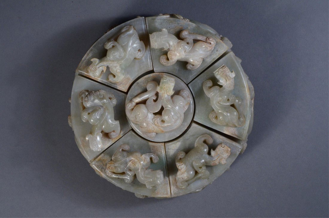 Fine 18th C. Chinese White Jade Set of 7 Seals: Fine 18th Century Chinese carved white jade set of seven seals; seven jade seals contained within jade circular case carved with encircling chilong in relief; each jade seal surmounted by chilong in r