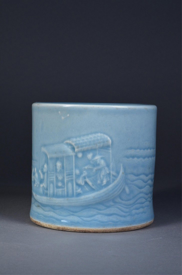 Chinese Monochrome Glazed Porcelain Brush Pot Mark: Chinese monochrome glazed porcelain brush pot; cylindrical body featuring carved fishing boat; on verso, featuring scrip calligraphy; four-character mark on base; H: 12 cm, D: 12 cm