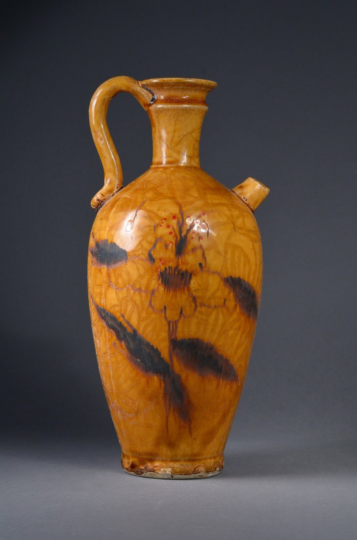 Chinese Brown Glazed Wine Pot: Chinese brown glazed wine pot; painted lotus motif; base unglazed; H: 28 cm, D: 10 cm