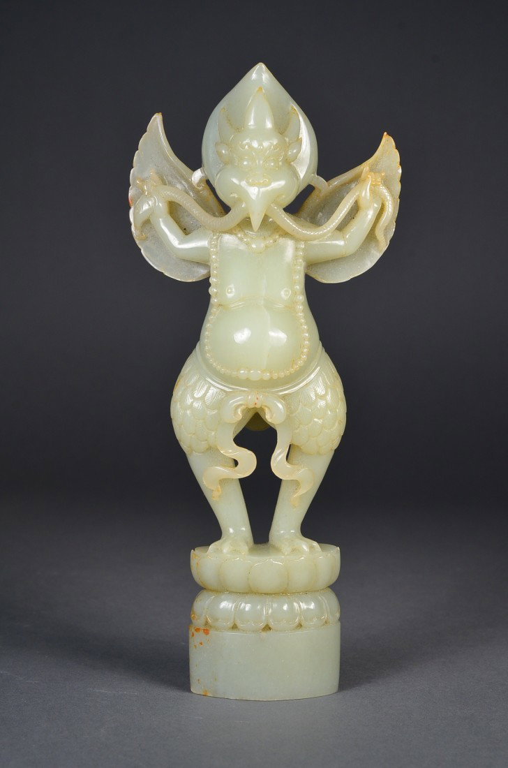 Chinese Carved Jade Figure of Buddhist Garuda: Chinese carved white jade figure; featuring Buddhist mythical bird, Garuda; H: 22 cm, L: 10 cm, W: 4 cm, 566 grams